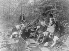 Students from Western High School studying biology outdoors at a stream, Washington, D.C., (1899?). Creator: Frances Benjamin Johnston