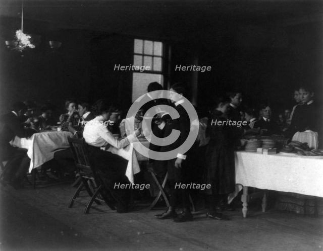 Students having a meal, Western High School, Washington, D.C., (1899?). Creator: Frances Benjamin Johnston.