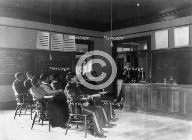 Students in class learning how to prepare sulphuric acid, Hampton Inst..,  Va., between 1899 & 1900. Creator: Frances Benjamin Johnston.