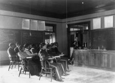 Students in class learning how to prepare sulphuric acid, Hampton Inst.., Va., between 1899 & 1900. Creator: Frances Benjamin Johnston