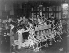 Students in a chemistry class conducting an experiment, Western High School, Washington DC, (1899?). Creator: Frances Benjamin Johnston