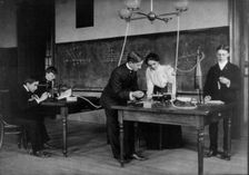 Students in a science class conducting experiments, Western High School, Washington, D.C., (1899?). Creator: Frances Benjamin Johnston