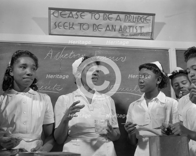 Students in the home economics class, Daytona Beach, Florida, 1943. Creator: Gordon Parks.
