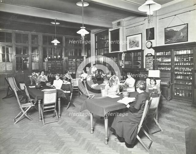 Students in the Social Hall, Ackmar Road Evening Institute for Women, London, 1914. Artist: Unknown.
