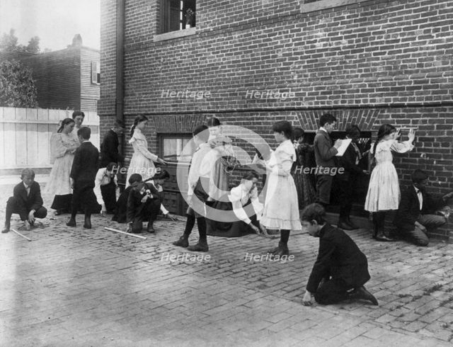 Students of 8th Division school using rulers, yardsticks, and measuring..., Washington, DC, (1899?). Creator: Frances Benjamin Johnston.