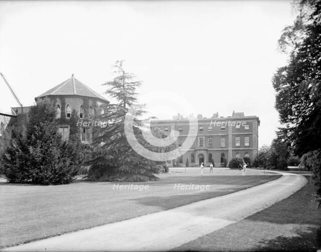 Students playing tennis on the lawn, Radley College, Radley, Oxfordshire, c1860-c1922. Artist: Henry Taunt