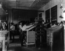 Students working in print shop, Tuskegee Institute, Alabama, 1902. Creator: Frances Benjamin Johnston