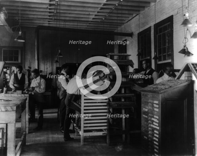 Students working in print shop, Tuskegee Institute, Alabama, 1902. Creator: Frances Benjamin Johnston.