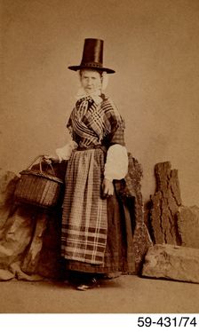 Studio photograph of a woman in Welsh costume, c1880s. Creator: Edwin P Lee