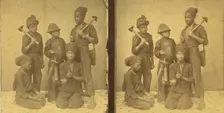 Studio portait of young chimney sweeps, (1868-1900?). Creator: J. N. Wilson