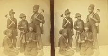Studio portait of young chimney sweeps, (1868-1900?). Creator: J. N. Wilson
