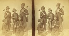 Studio portait of young chimney sweeps, (1868-1900?). Creator: J. N. Wilson