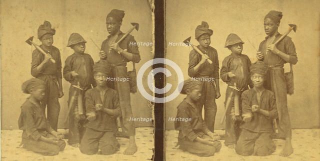 Studio portait of young chimney sweeps, (1868-1900?). Creator: J. N. Wilson.