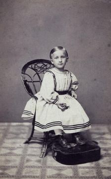 Studio portrait of a 3 year old girl, c1870