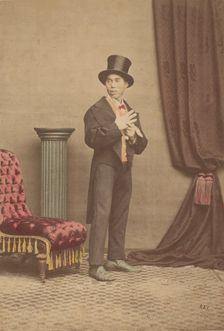 [Studio Portrait of a Japanese Man in Western Clothing], 1880s. Creator: Baron Raimund von Stillfried