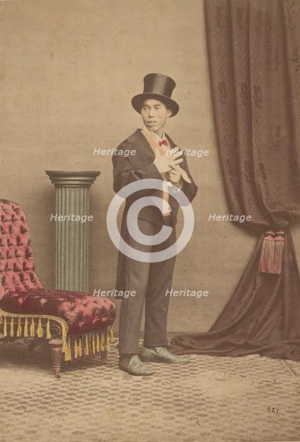 [Studio Portrait of a Japanese Man in Western Clothing], 1880s. Creator: Baron Raimund von Stillfried.