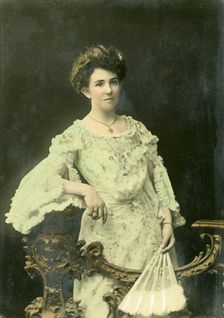 Studio portrait of a lady with fan, 1902. Creator: M Livesey