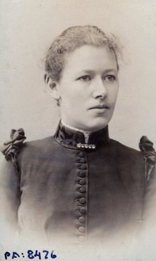 Studio portrait of an 18 year old girl, c1900. Creator: Unknown