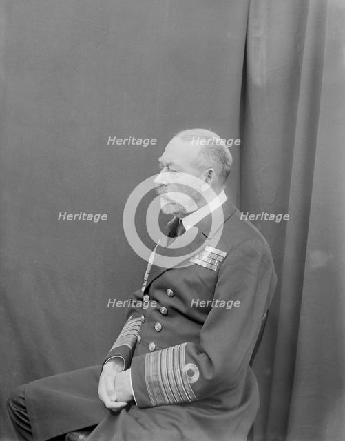 Studio portrait of George V taken aboard 'HMY Victoria and Albert', c1935. Creator: Kirk & Sons of Cowes.
