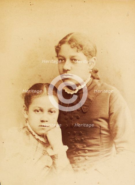 Studio portrait of two young women, c1860-c1869. Creator: HD Garns & Co.
