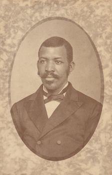 Studio portrait of unidentified man wearing double-breasted jacket, c1870-c1880. Creator: F Wagner & Sons