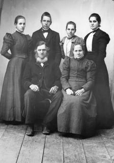 Studio portrait: "Sitting: Lispa Per, Karin Eriksson Standing from left Anna, Edvard..., 1890-1900. Creator: Lars Olsson Akerman
