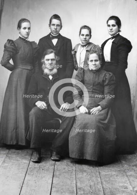Studio portrait: "Sitting: Lispa Per, Karin Eriksson Standing from left Anna, Edvard..., 1890-1900. Creator: Lars Olsson Akerman.