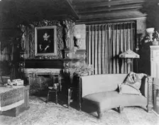 Study with portrait of woman in Elizabethan dress, over fireplace..., Greenwich, Connecticut, 1908. Creator: Frances Benjamin Johnston