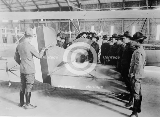 Studying aeroplane [i.e. airplane] rudder, 1917 or 1918. Creator: Bain News Service.