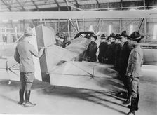 Studying aeroplane [i.e. airplane] rudder, 1917 or 1918. Creator: Bain News Service