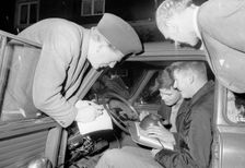 Studying the map in a car rally, Landskrona Motor Club, Sweden, 1965. Creator: Unknown