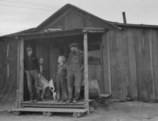 Stump farm family and their present home, Boundary County, Idaho, 1939. Creator: Dorothea Lange