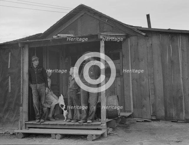 Stump farm family and their present home, Boundary County, Idaho, 1939. Creator: Dorothea Lange.