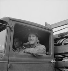 Stump farmer hauling load of slab wood for sale in town, Bonner County, Idaho, 1939. Creator: Dorothea Lange