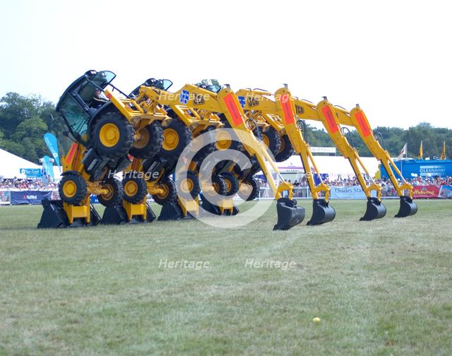 Stunt JCB diggers perfoming formation "dance" routine at New Forest show 2006. Creator: Unknown.
