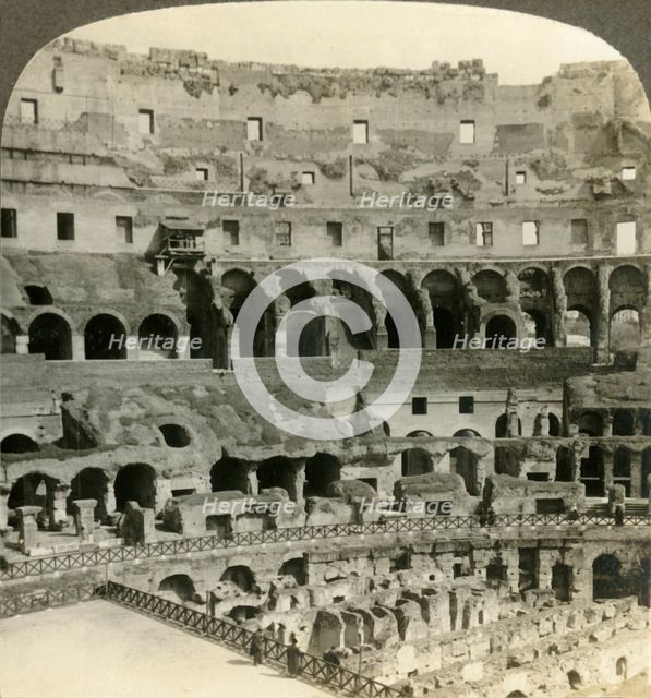 'Stupendous interior of the Colosseum, with dens of wild beasts, Rome', c1909. Creator: Unknown.