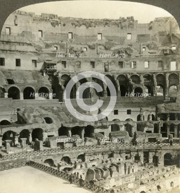 'Stupendous interior of the Colosseum, with dens of wild beasts, Rome', c1909. Creator: Unknown.