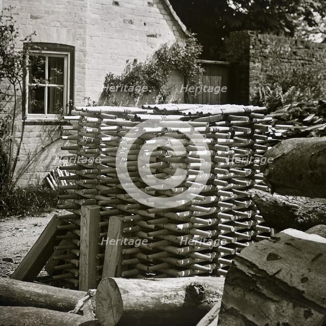 Stack of turned chair legs, Turville, Buckinghamshire, early 20th century. Artist: Unknown.