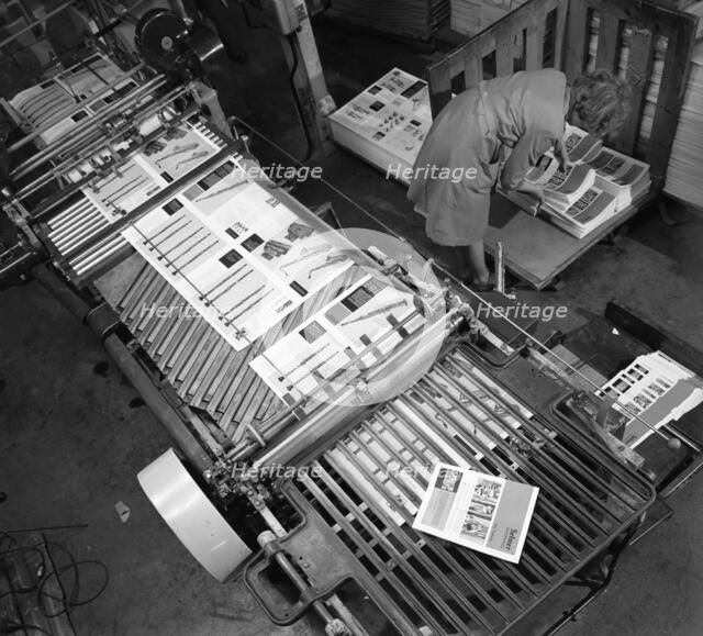 Stacking finished brochures at a printers, Mexborough, South Yorkshire, 1959. Artist: Michael Walters