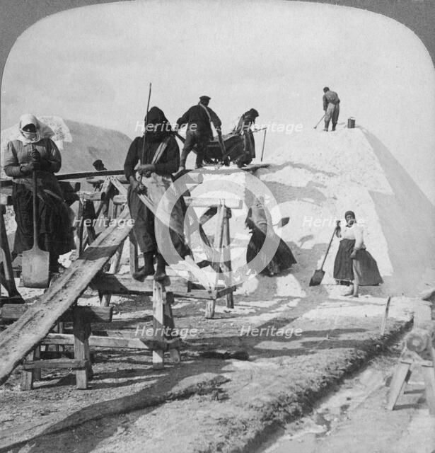 Stacking salt in the great salt fields of Solinen, Black Sea, Russia, 1898.  Artist: Underwood & Underwood