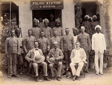 Staff from the Rambagh section of the Karachi Plague Committee, standing outside the police..., 1897 Creator: Unknown