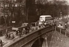 Staff leaving work at lunchtime, Rowntree factory, York, Yorkshire, 3 March 1938