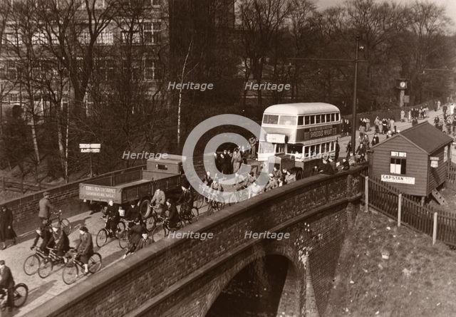 Staff leaving work at lunchtime, Rowntree factory, York, Yorkshire, 3 March 1938. Artist: Unknown