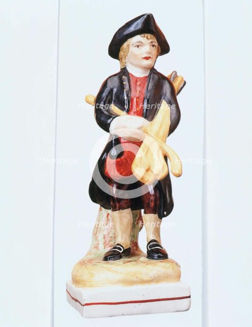 Staffordshire golfing figure, c1900. Artist: Unknown