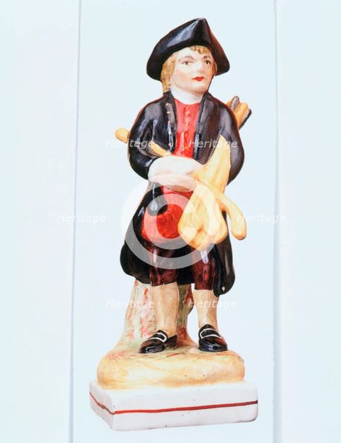Staffordshire golfing figure, c1900. Creator: Unknown.