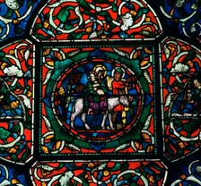 Stained glass depiction of the holy family fleeing to Egypt, 12th century