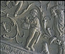 Stairway of the Senior Schools of the University of Salamanca. Detail of the relief of a musician…