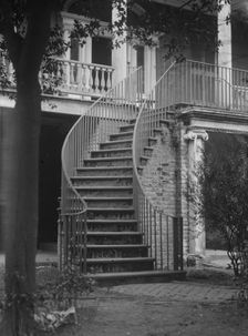 Stairway to the first floor of a building, [16 Charlotte Street], Charleston, South..., c1920-1926. Creator: Arnold Genthe