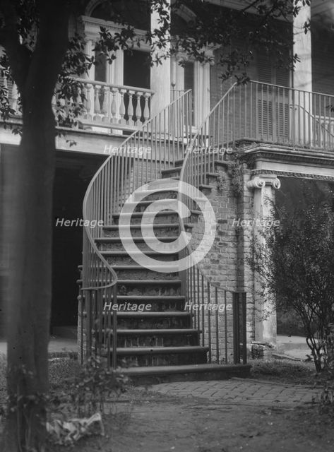 Stairway to the first floor of a building, [16 Charlotte Street], Charleston, South..., c1920-1926. Creator: Arnold Genthe.