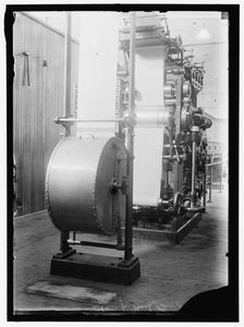 Stamp machine, between 1910 and 1917. Creator: Harris & Ewing